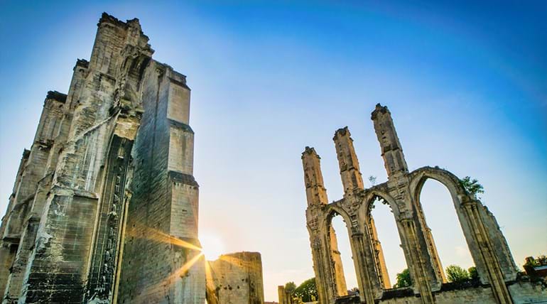 ruins of an abbey at sunset